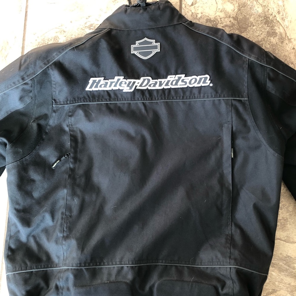 NEVER WORN WITH PROTECTIVE BUILT INS